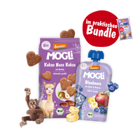MOGLi x schleich Schulstart Bundle Lila: Packshots von Kakao Nuss Keksen, Blaubeer Quetschie und schleich Orang Utan Junges